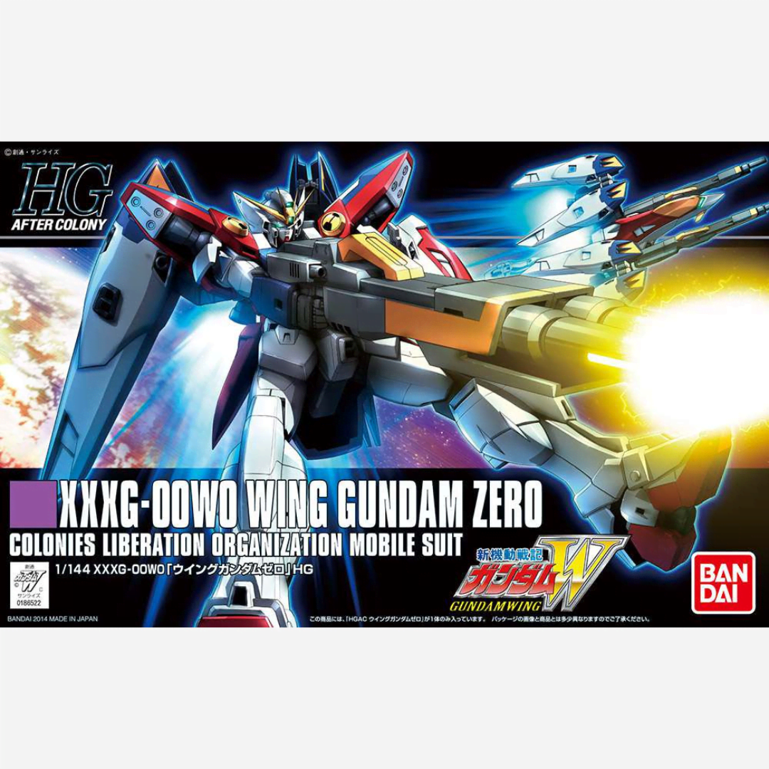 Box model kit HG 1/144 Wing Gundam Zero Bandai con Buster Rifle e ali spiegate in posa dinamica da battaglia tratto da Gundam Wing