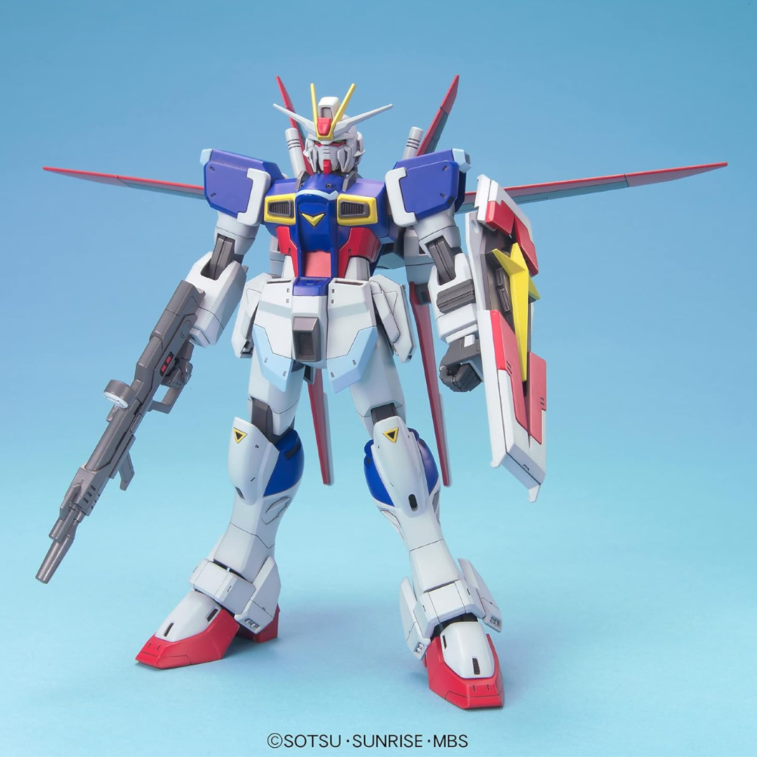 Box MG Force Impulse Gundam ZGMF-X56S da Gundam SEED Destiny – Master Grade Bandai da montare senza colla, completo di armi e Force Silhouette.