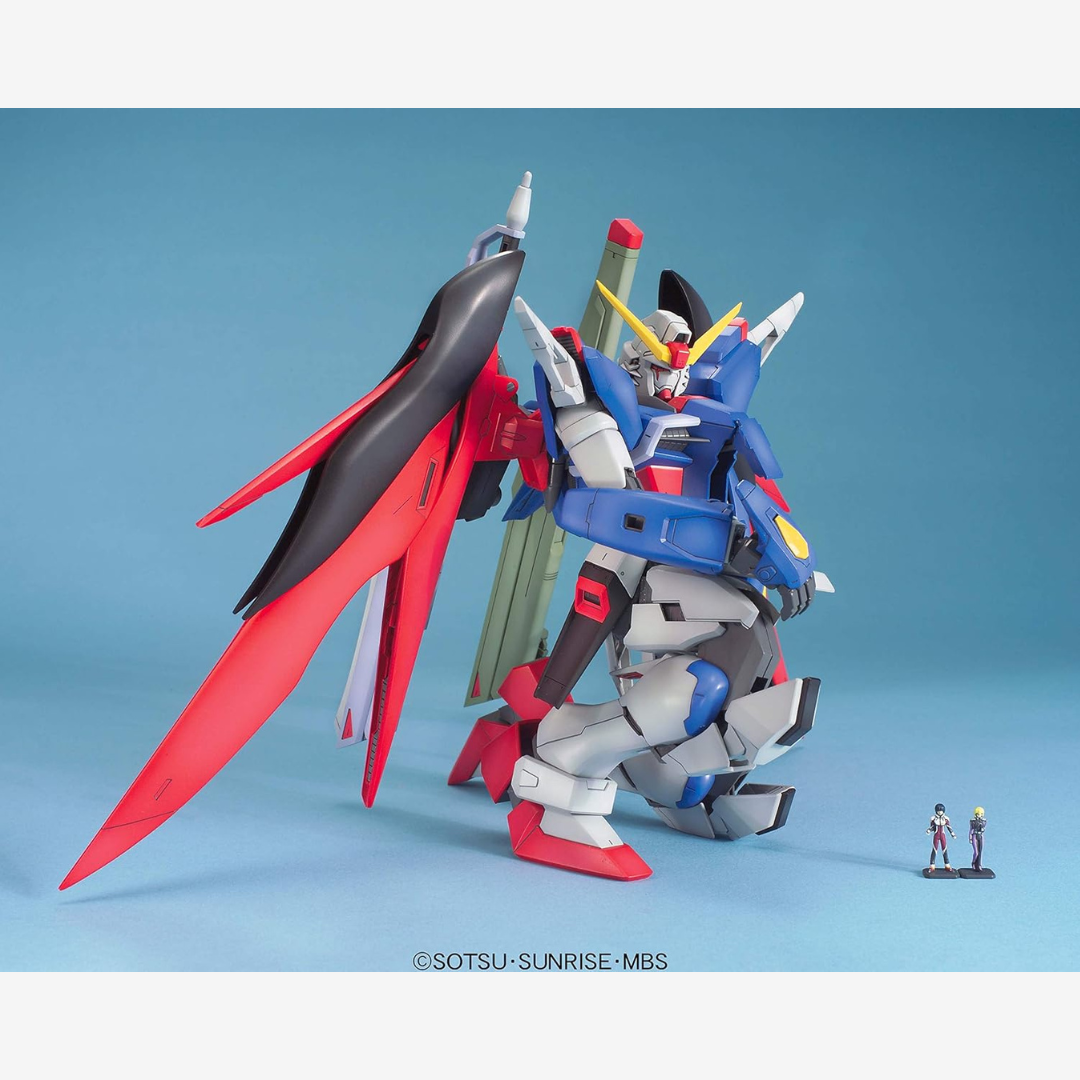 Box MG Destiny Gundam SEED Master Grade Bandai – Gunpla con spada Anti-Ship, ali translucide e dettagli realistici da montare senza colla.
