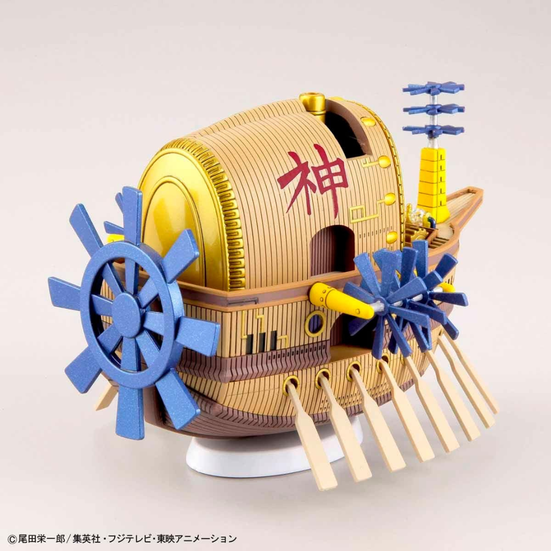 Illustrazione confezione Bandai Grand Ship Collection Ark Maxim, nave volante dorata di Eneru da One Piece, kit da montare senza colla per fan e collezionisti