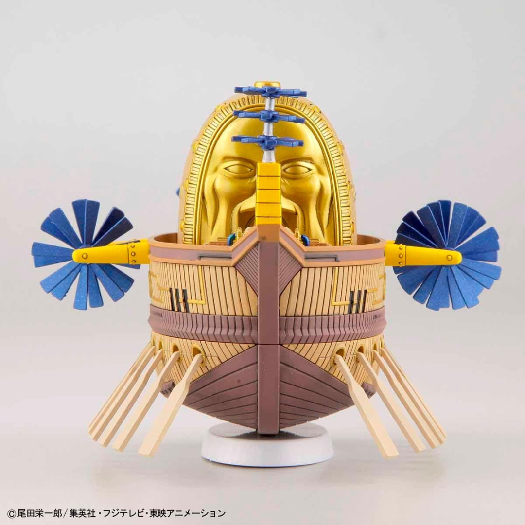 Illustrazione confezione Bandai Grand Ship Collection Ark Maxim, nave volante dorata di Eneru da One Piece, kit da montare senza colla per fan e collezionisti