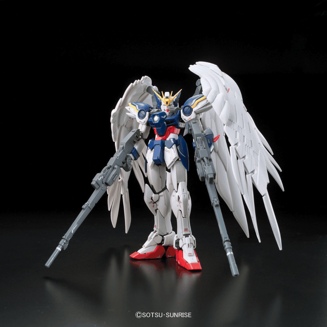 Box RG 1/144 Wing Gundam Zero EW Bandai – Gunpla Real Grade con Twin Buster Rifle, ali piumate e dettagli realistici. Kit senza colla da collezione.