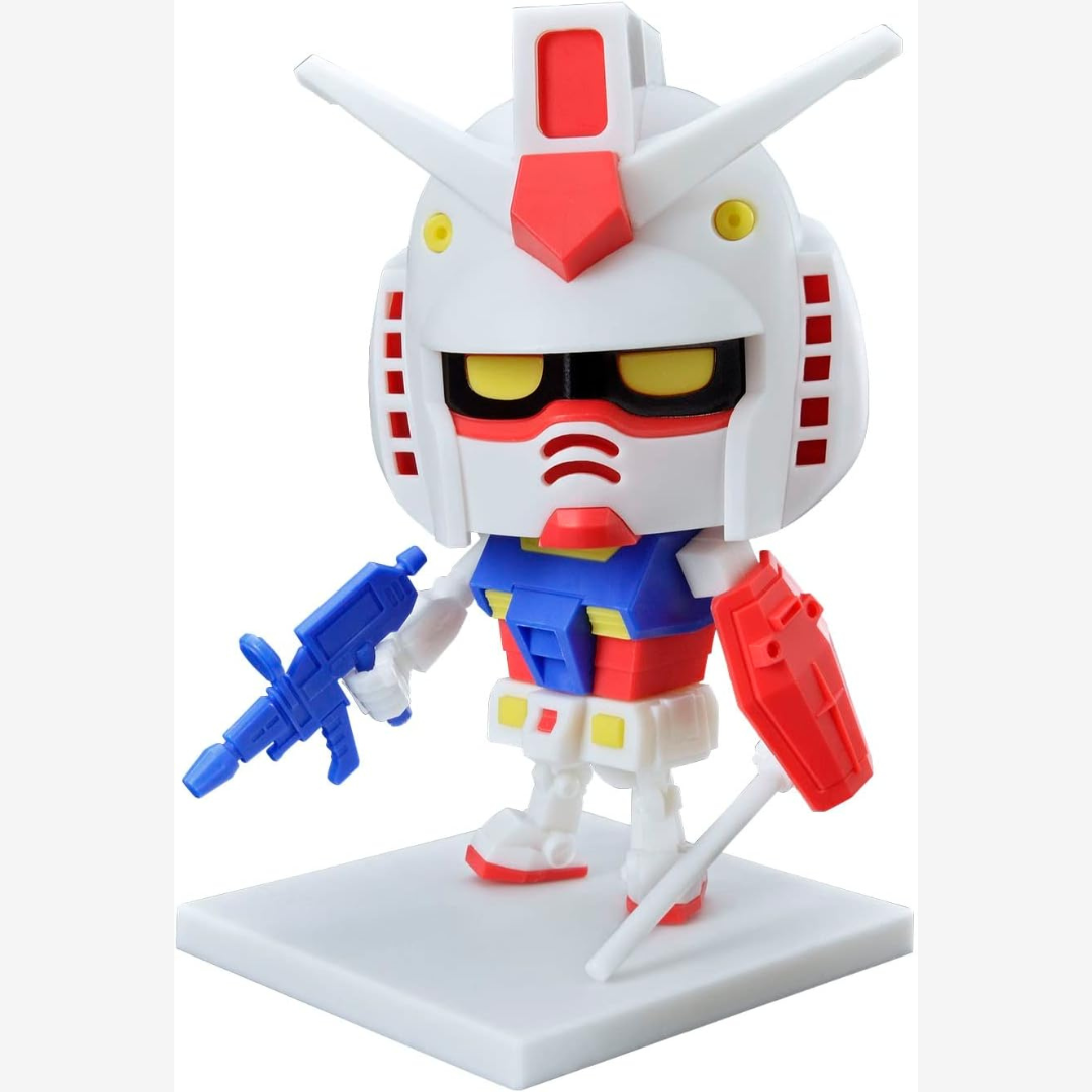 Scatola Gunpla-Kun DX Set Runner Ver Bandai: model kit chibi ispirato a RX-78-2, montaggio senza colla, stile kawaii, ideale per fan e collezionisti.

