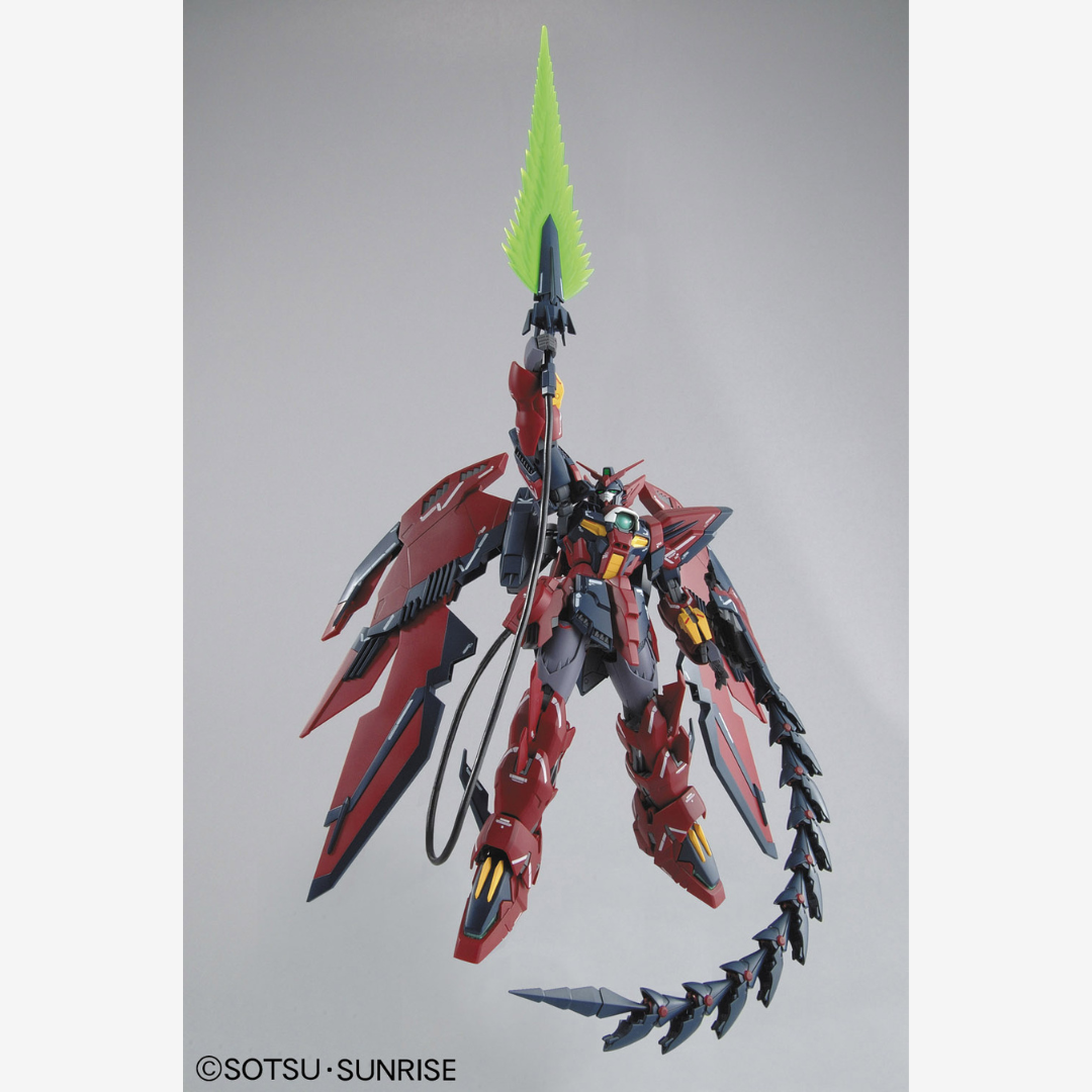 Box MG Gundam Nataku Endless Waltz – Gunpla Master Grade Bandai con Dragon Fangs, dettagli curati e stile ispirato all’anime Gundam Wing.

